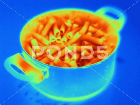 Pasta boiling in pot Stock Photos