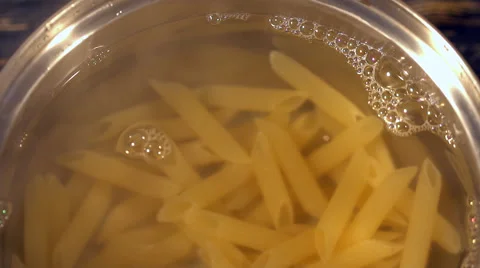 Pasta in boiling water, close up Stock Footage 68635702