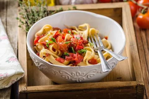 Pasta with cherry tomatoes pesto Stock Photos