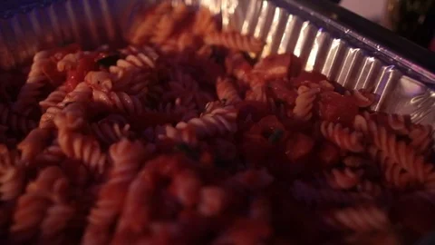Pasta close dark in serving tray Video stock 97816158