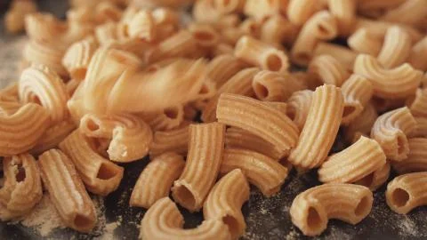 Pasta Closeup of process of making cooking Penne pasta Stock Photos