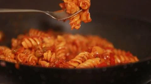 Pasta Closeup of process of making cooking Penne pasta Stock Photos