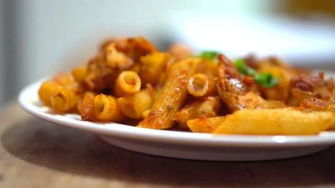 Pasta Closeup of process of making cooking Penne pasta Stock Photos