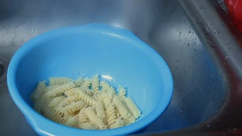 Pasta in a colander Stock Footage 93149338