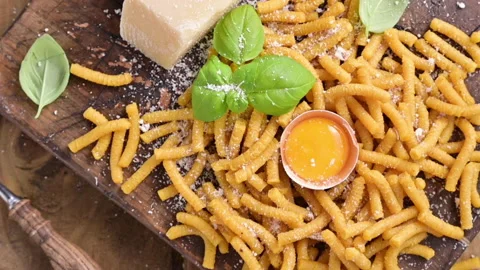 Pasta cooked in chicken broth , fresh pasta. Passatelli in brodo. 動画素材 147866804