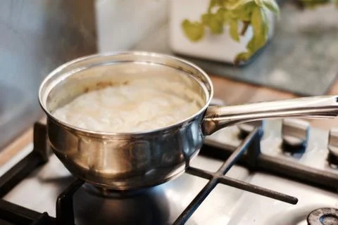 Pasta cooking in silver pot Stock Photos