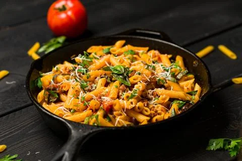 Pasta on dark background. Stock Photos