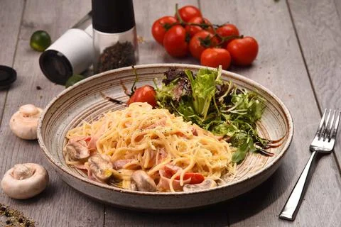 Pasta Dinner on Table Stock Photos