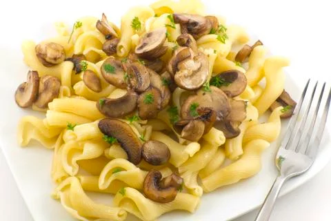 Pasta dish gigli con funghi Foto stock