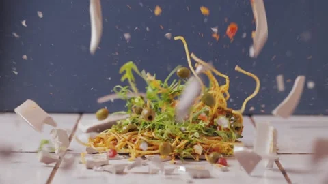 Pasta dish hitting the floor breaking Stock Footage 312478570