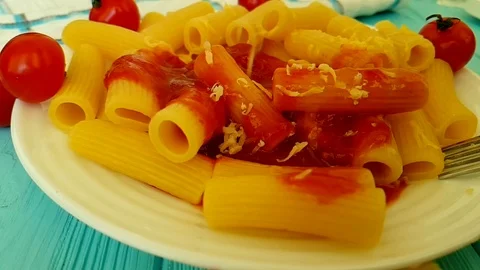Pasta with drops ketchup, cheese drops Video stock 89713069