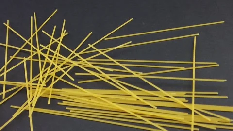 Pasta dry spaghetti slow motion on a black background Stock Footage 144789254
