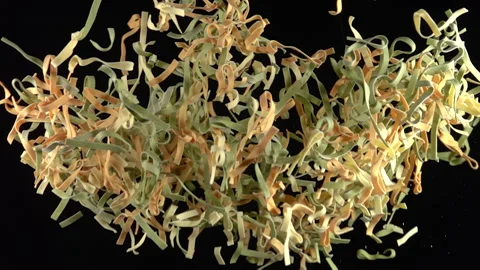 Pasta explosion on black background 500fps Stock Footage 152664691