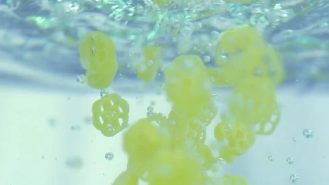 Pasta fall in water in slow motion Stock Footage 76040815