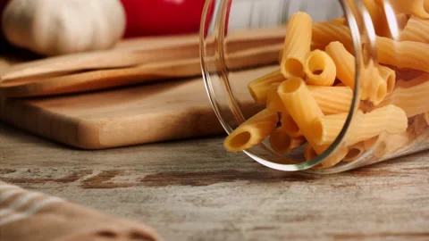 Pasta falling and bouncing in slow motion Stock Footage 156810023