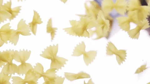 Pasta falling on a transparent background, bottom view. Pasta background Stock Footage 155507076