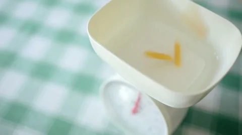 Pasta falling in weight scale Stock-Footage 43367470