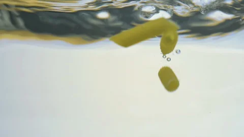 Pasta falls into a pot Stock Footage 119385411
