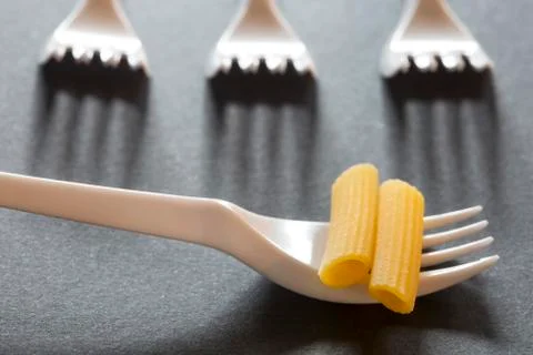 Pasta on forks Stock Photos