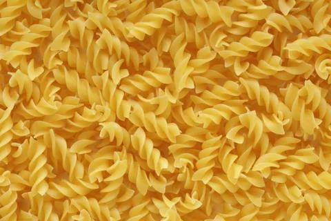 Pasta fusilli background Stock Photos