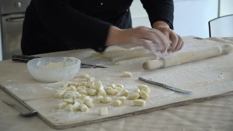 Pasta gnocchi pan front view preparing slice of pasta Stock Footage 128988018