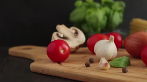 Pasta ingredients spaghetti cherry tomatoes mushrooms onion basil garlic Stock Footage 110538005
