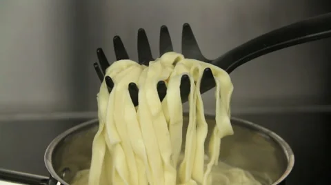 Pasta Lifted Out Of Pot With Fork. Stock Footage 45900519