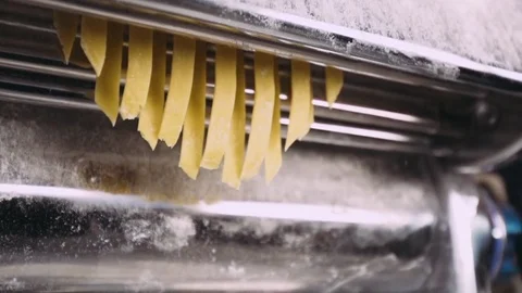 https://images.pond5.com/pasta-machine-makes-pasta-dough-footage-076555399_iconl.jpeg