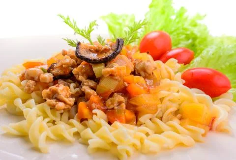 Pasta with meat, tomato sauce and vegetables Fotos de archivo