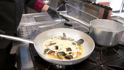 The Pasta Mixing Inside The Seafood Pan Stock Footage 287387595