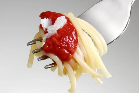 Pasta, Noodle Spaghetti, Tomatensosse und Parmesan auf einer Gabel. Noodle... Stock Photos