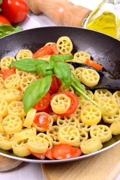 Pasta in the pan Stock Photos