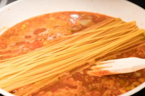 Pasta in a pan Stock Photos