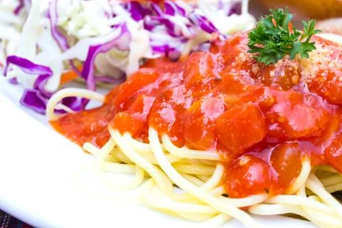 Pasta with parsley with tomato sauce Stock Photos