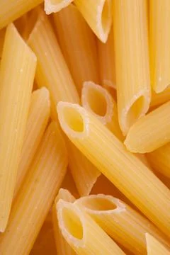 Pasta Penne texture background. High quality photo. Stock Photos