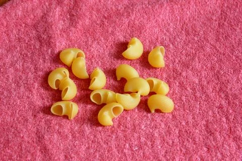 Pasta on the pink background Stock Photos