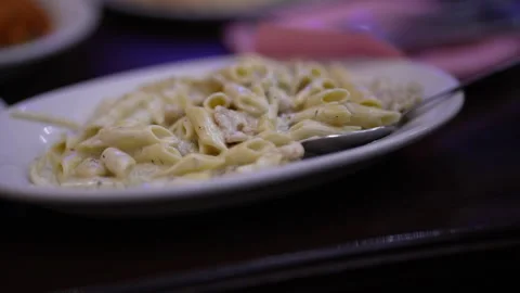Pasta in a plate with sauces Stock Footage 246997549
