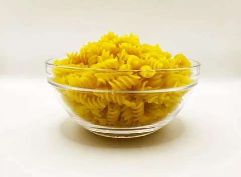 Pasta in a plate on a white background. A portion of pasta Stock Photos