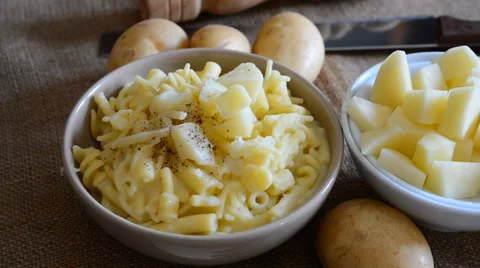 Pasta by potatoes Stock Footage 39905983