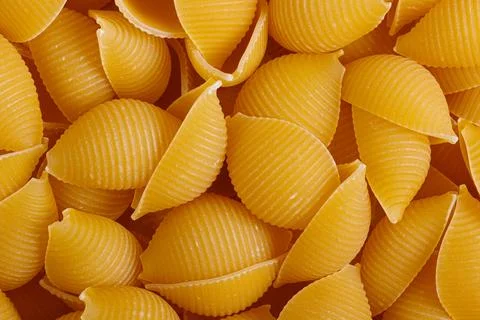 Pasta products in the form of a shell, texture Stock Photos