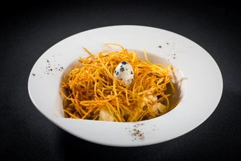 Pasta with quail egg Stock Photos
