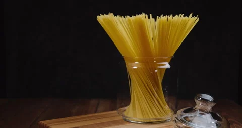 Pasta rotating on the table. On a black background. 動画素材 155241671