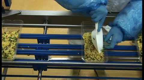 Pasta salad on assembly line Stock Footage 18551210