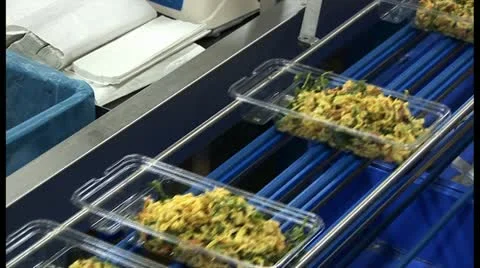 Pasta salad on assembly line Stock Footage 18554830
