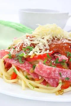 Pasta with salami Stock Photos