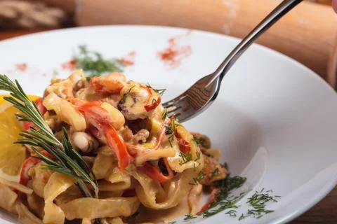 Pasta with seafood on a fork. Stock-Fotos