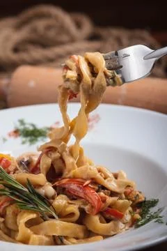 Pasta with seafood on a fork. Stock-Fotos