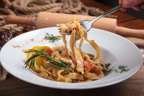 Pasta with seafood on a fork. Stock-Fotos