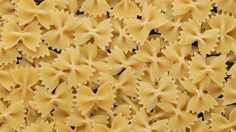 Pasta in the shape of a bow, top view. Stock Footage 138160723
