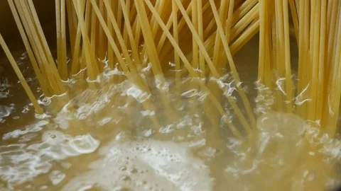 Pasta spaghetti in boiling water, close up Stock Footage 82317549
